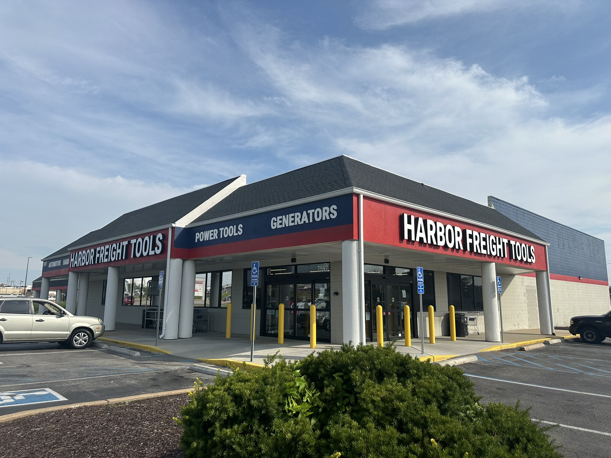 shopping center with cars parked in front